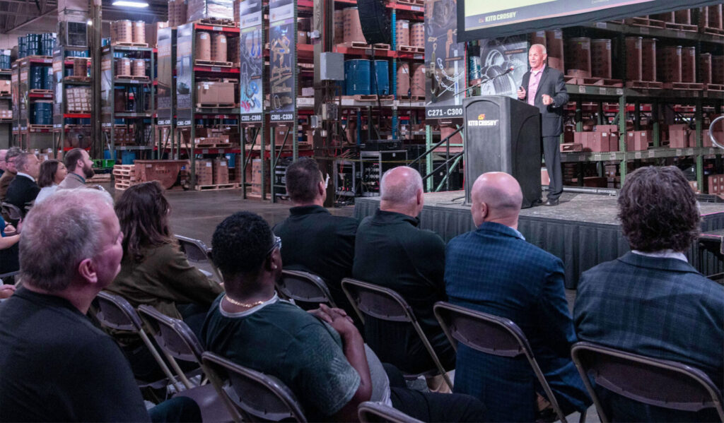 George Kosidowski, President, Peerless, officially kicks off the ribbon cutting ceremony with a group of Kito Crosby team members, local dignitaries, and International Association of Machinists & Aerospace Workers (IAMAW) leadership.