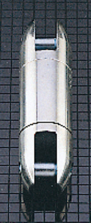 Shiny metallic object on a grid background, resembling a capsule or mechanical component.