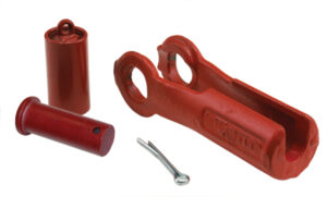 Red farm equipment replacement parts, including a hitch pin and linchpin, isolated on a white background.