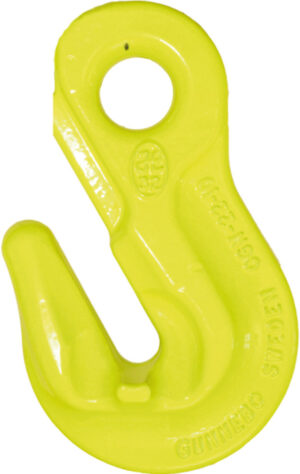 Bright yellow lifting hook for heavy-duty applications in industrial settings.